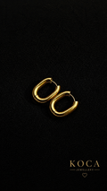 Gold Oval huggie earrings